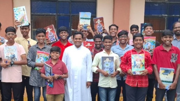 distribution of notebooks and pens to seminarians at pallotti vidyanam, vijayawada