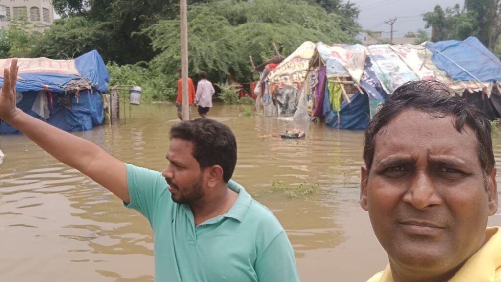 visiting the flood victims in amaravathi parish